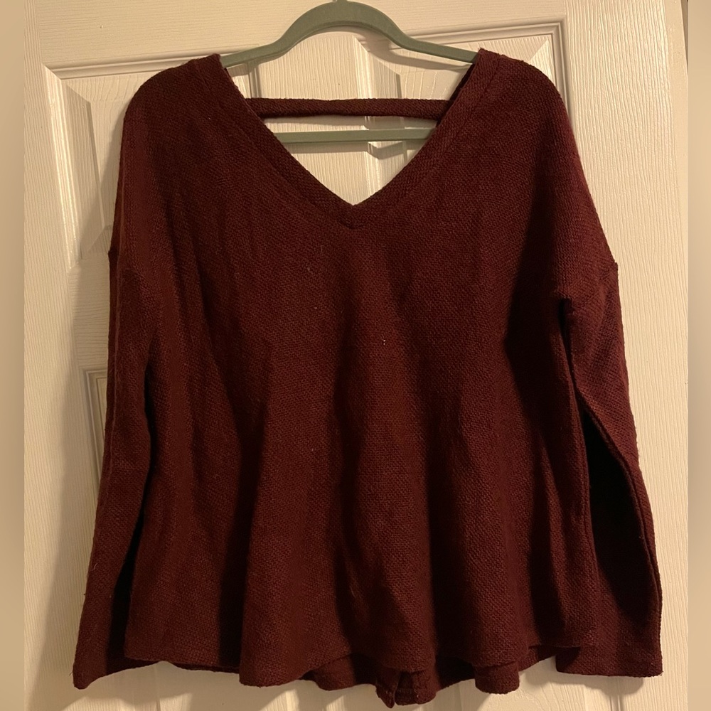 Jack by BB Dakota Wine colored swing sweater with open back & button detail